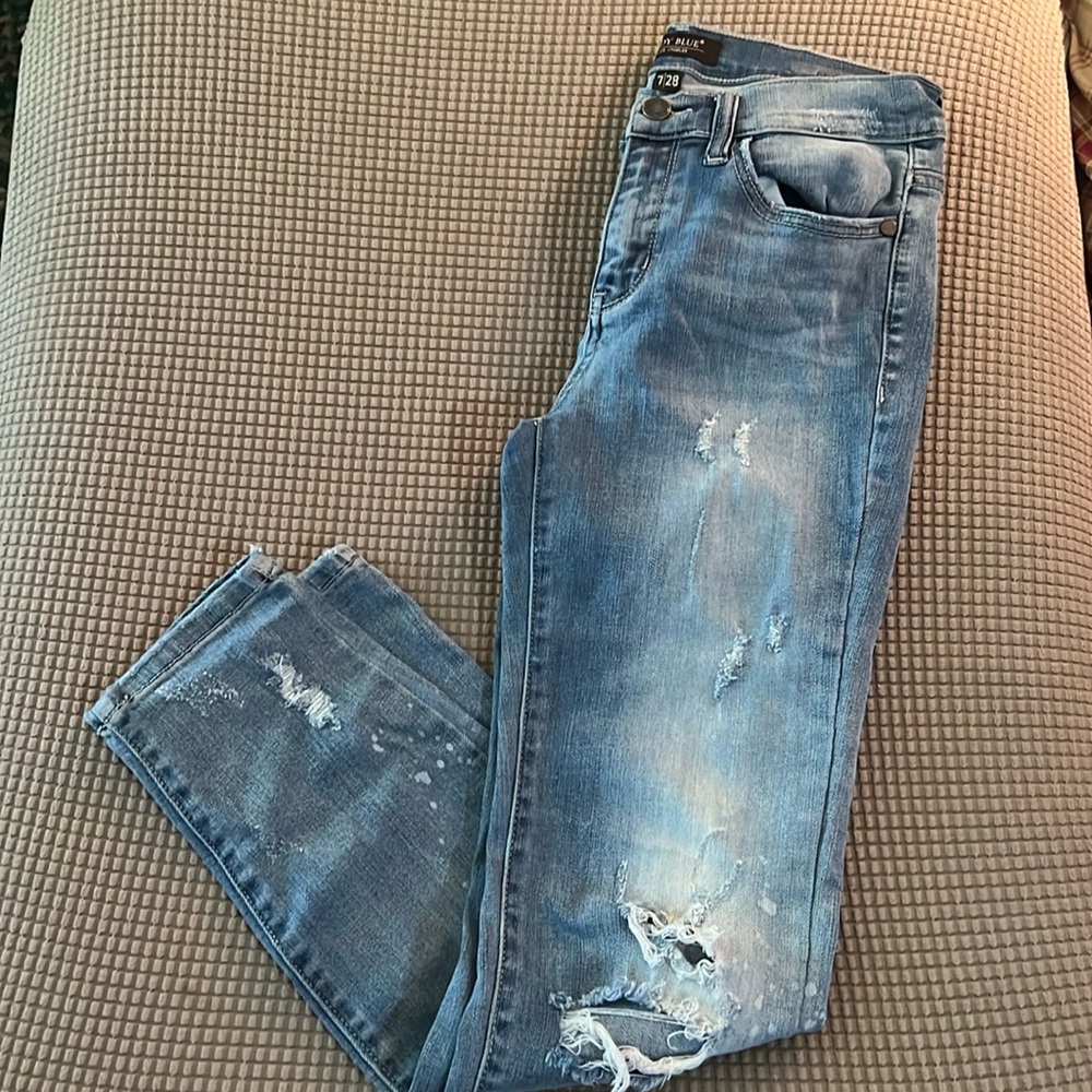 Judy Blue. Distressed. Tattered. Torn and holey. Splattered. Great jeggings!